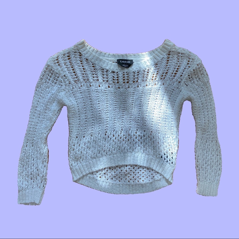 Selling a Bebe white knit sweater in a size XS.